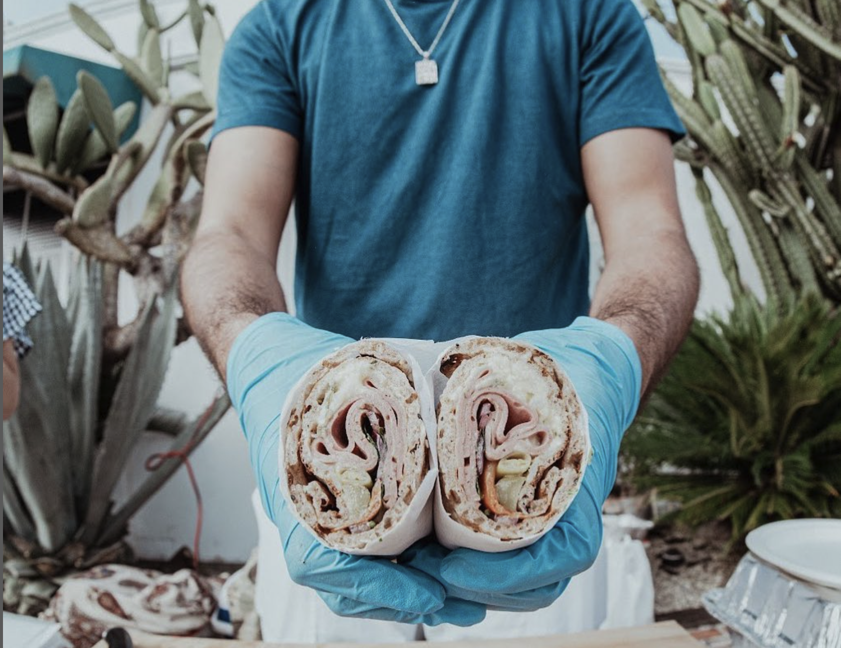 Meymuni Cafe & Bazaaar logo